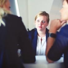 women in a meeting.