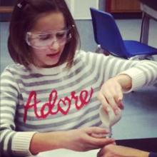 a blind girl doing an experiment.